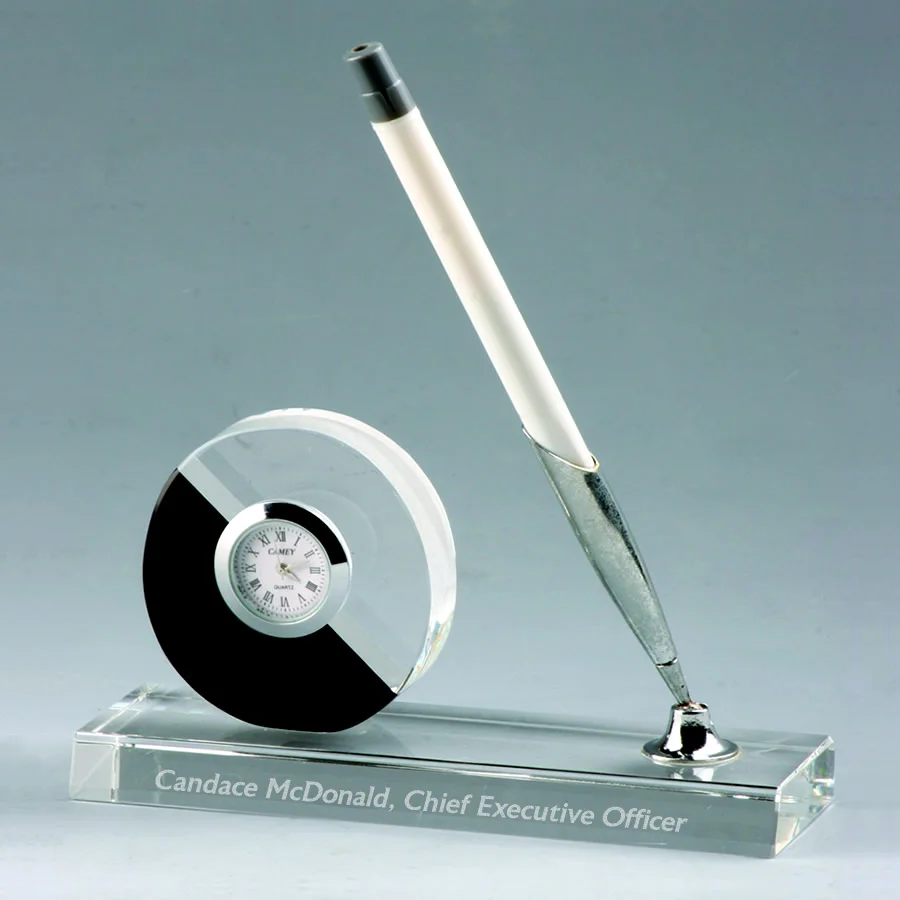round crystal clock with desk pen stand
