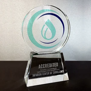 round crystal award with colored logo